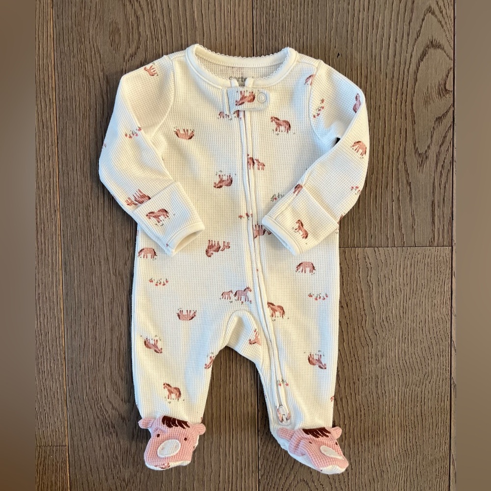 Bundle of 4 Newborn Footies from Carter’s.
